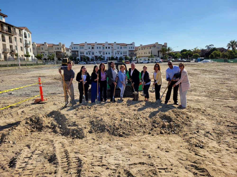 Group of people ground breaking 