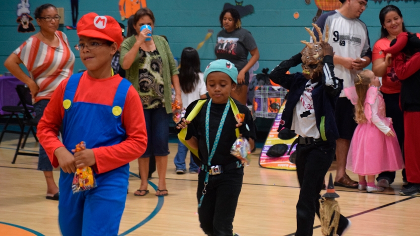 Children wearing Halloween costumes