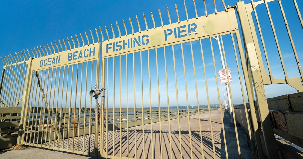 entrance of the ocean beach pier with closed gates