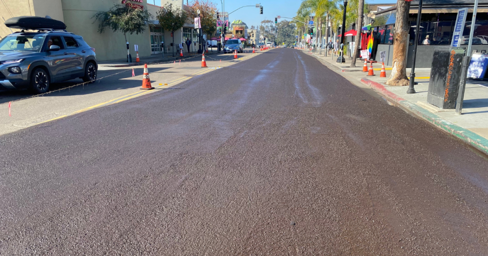 right side of the street with a fresh slurry seal treatment