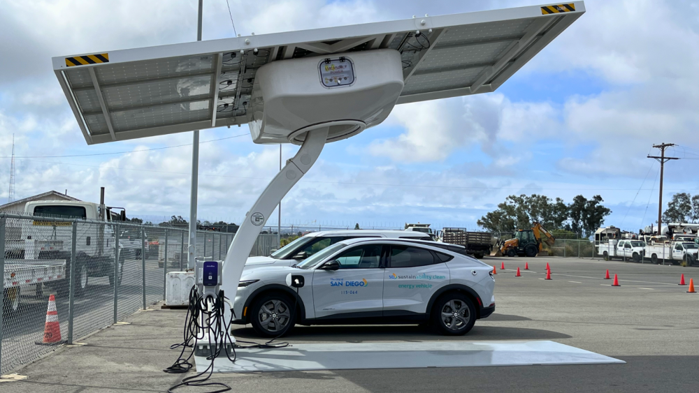 electric vehicle at a charging station in a city parking lot