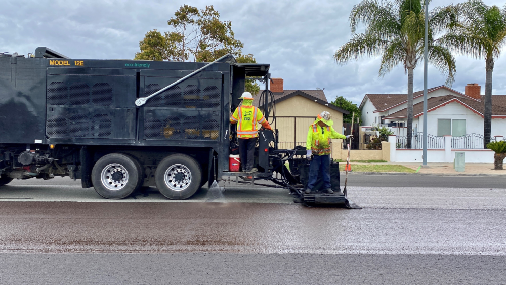 cres applying slurry seal on street 