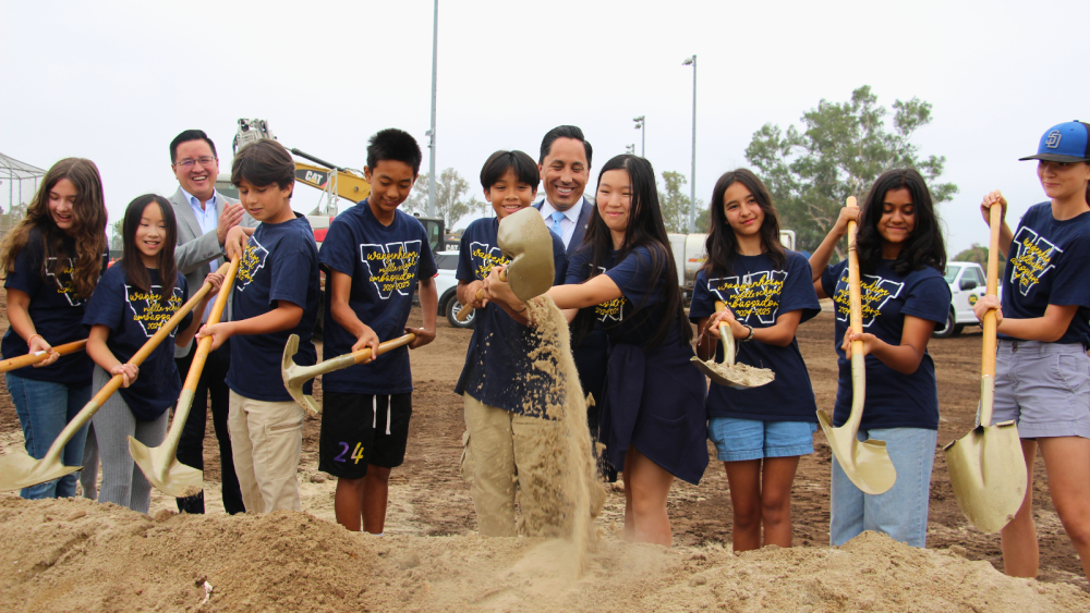 kids shoveling at groundbreaking