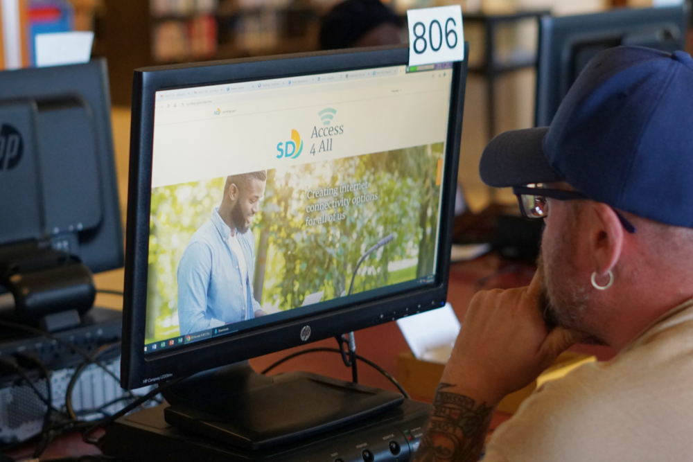 Man at a computer.