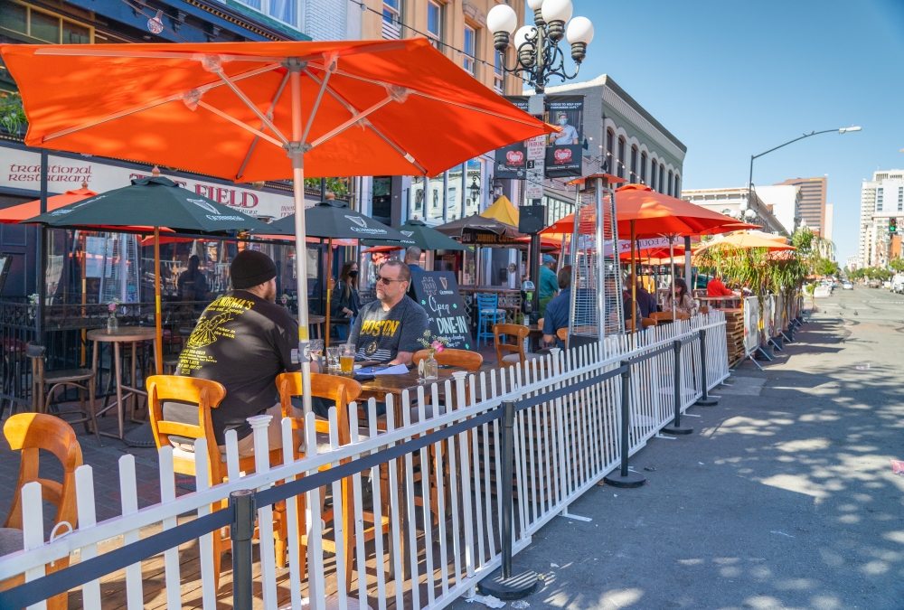 People eating at an outdoor patio 