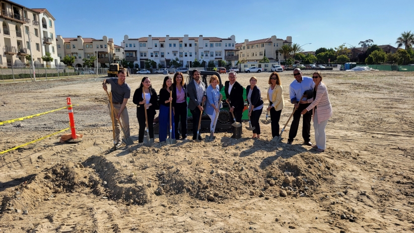 Group of people ground breaking 