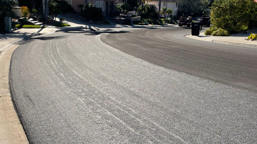 newly slurry sealed road in Torrey Hills