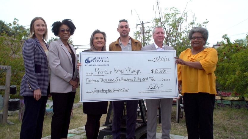 Councilmembers with large check 