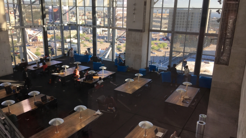 aerial view of two rows of desk at the library