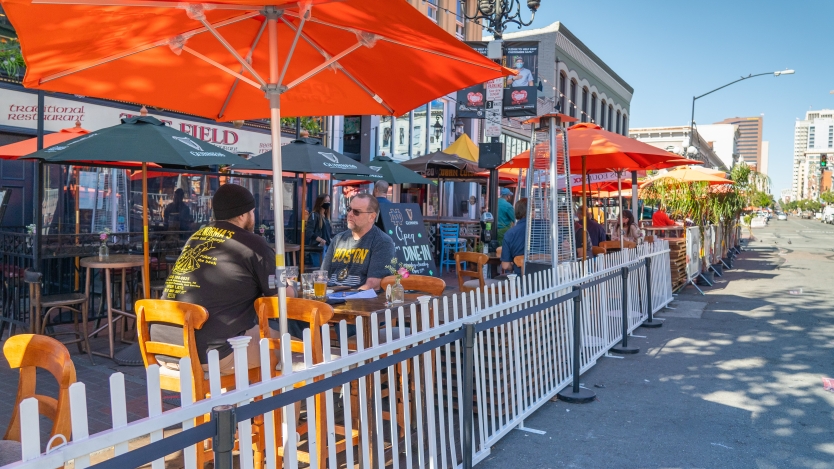 People eating at an outdoor patio 